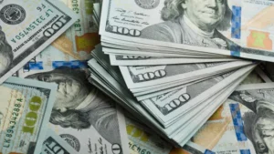 dolar-passa-a-cair-reagindo-a-cpi-dos-eua,-apos-subir-com-temor-sobre-guerra-eua-ira